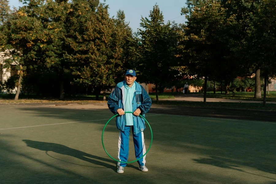 Man Holding a Hula Hoop