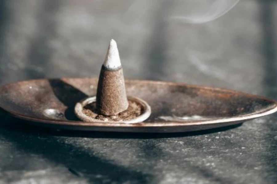 Metal incense holder for cones