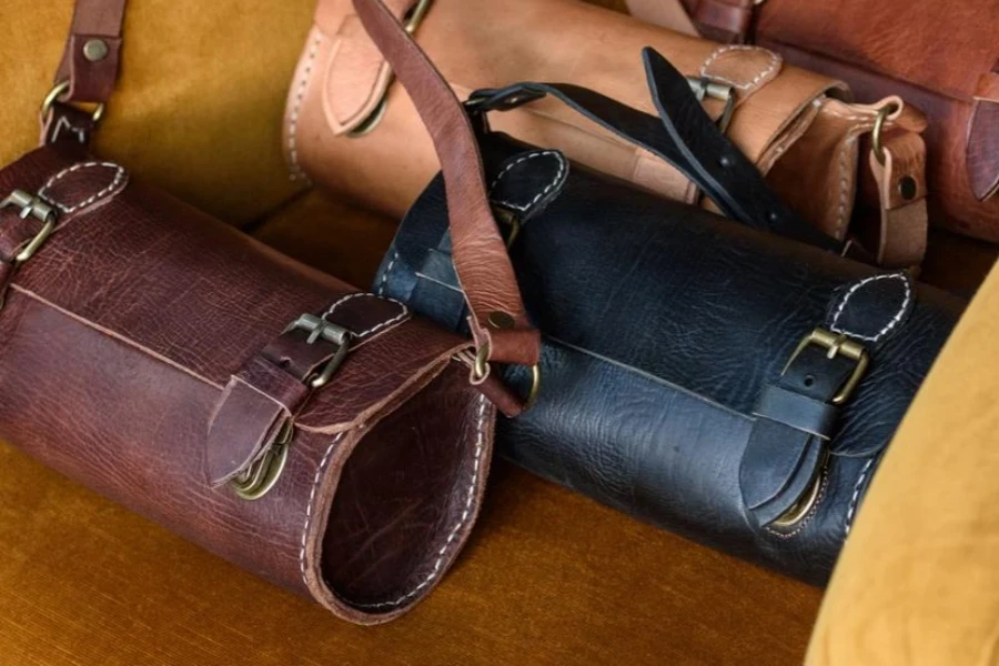Old vintage leather tube shape bags with leather strap