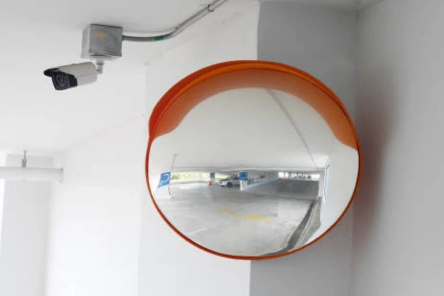 Outdoor corner fitted with convex mirror and new security camera