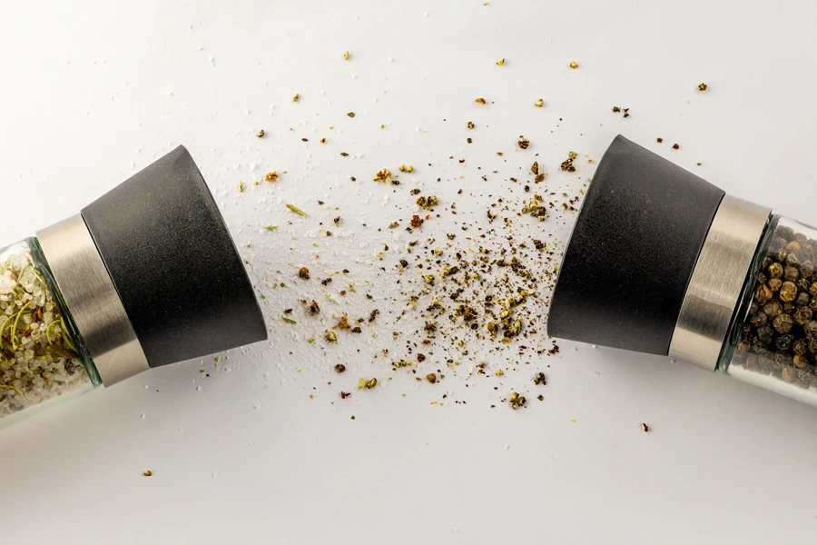 Pepper and salt mill made of combination of stainless steel