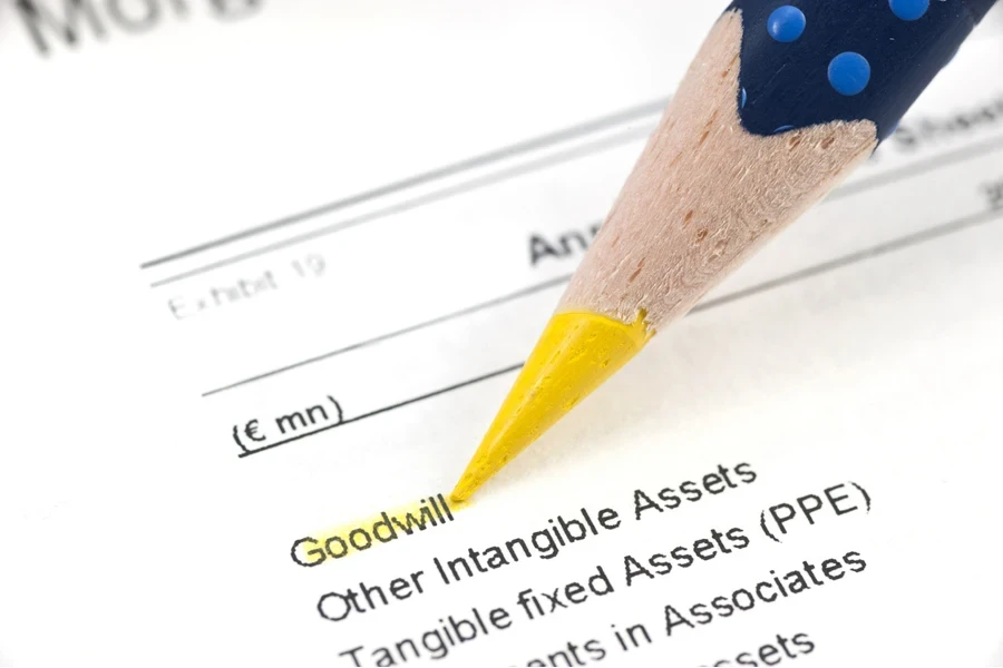 Person highlighting goodwill with yellow marker