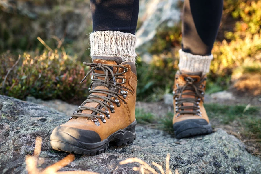 Person wearing alpaca socks on warm summer hike