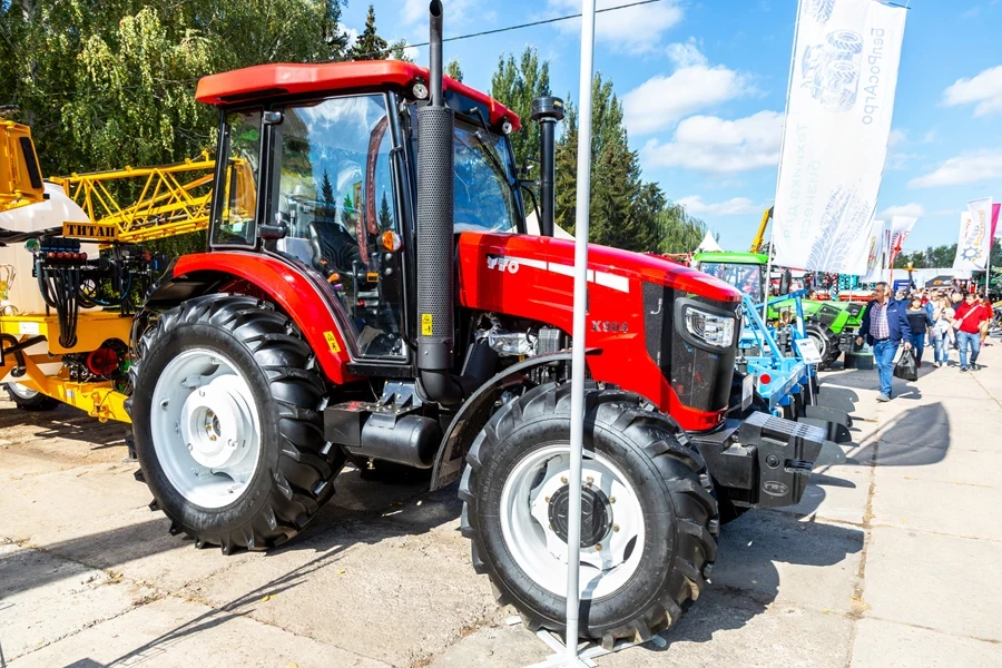 Red agricultural tractor in a show