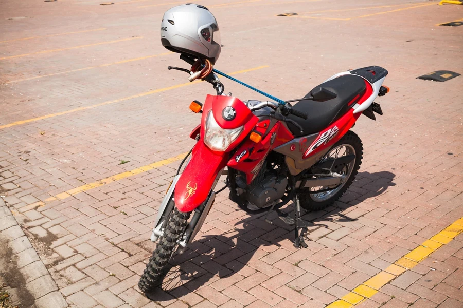 Red sport motorcycle on a pavement