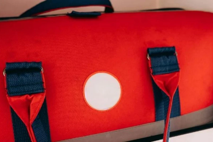 Red zippered fabric storage bag