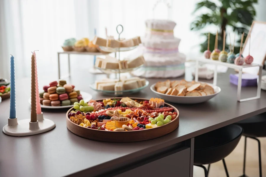 Round wooden food platter set up at party