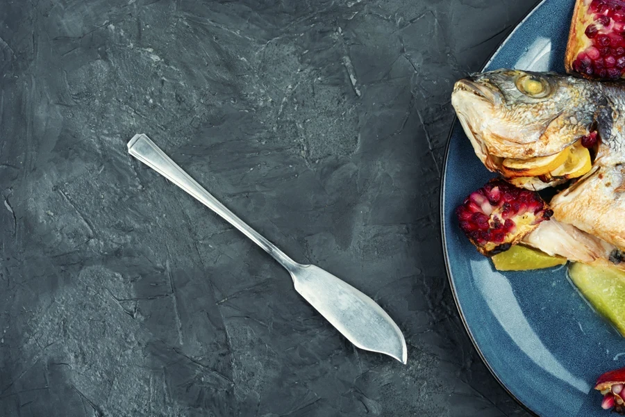 Single fish serving knife used during dining experience