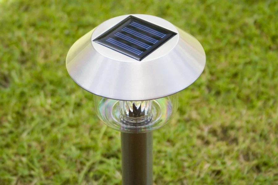 Single garden light with small solar panel on top
