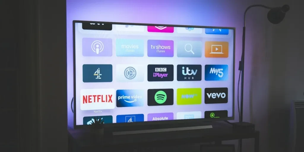 Smart TV with apps open on screen