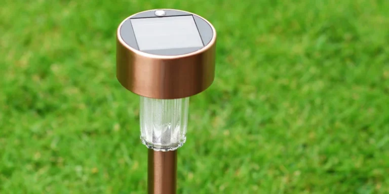 Solar-powered garden light in a lawn