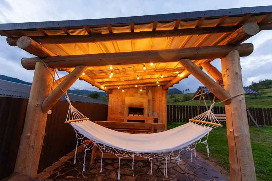 Solar string lights hung above hammock in garden