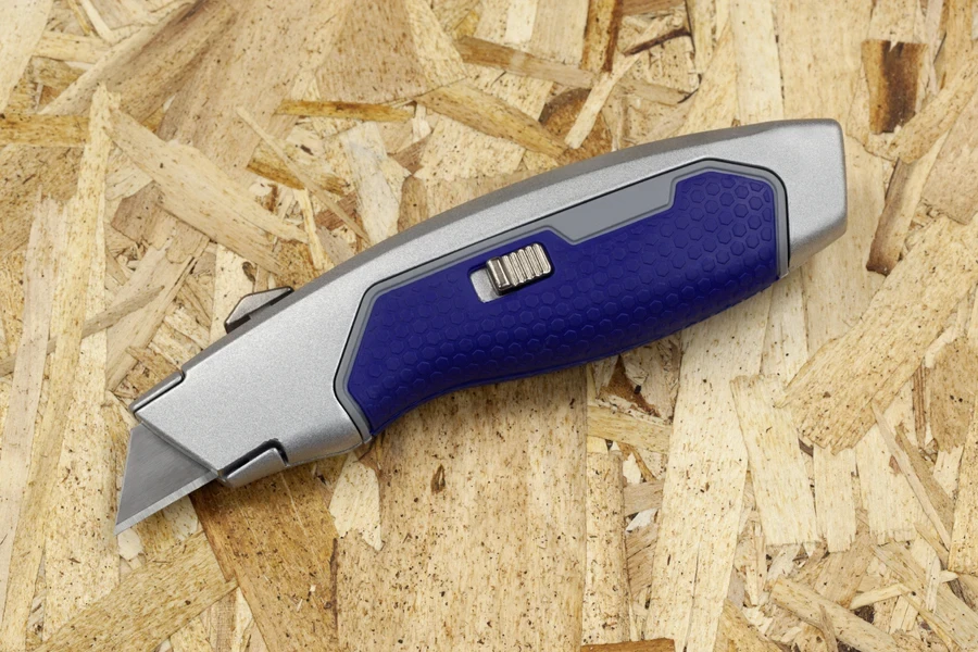 Stainless steel retractable utility knife with blue handle