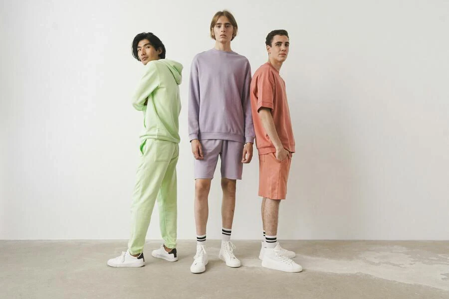 Three male models in casual outfits