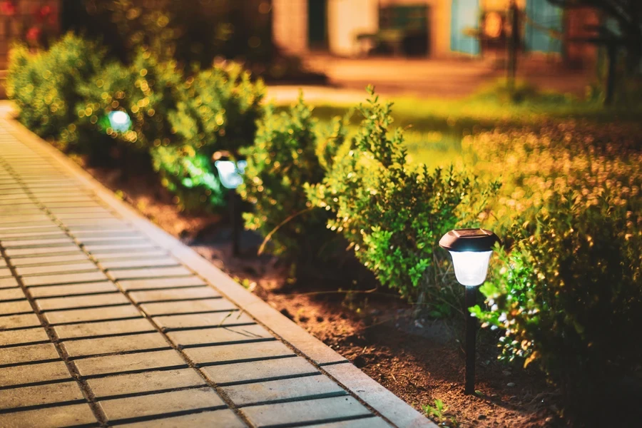 Tiled pathway using solar energy in outdoor lighting system