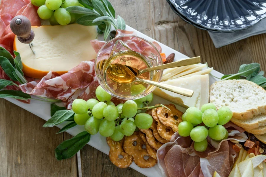 White porcelain rectangular plate with nibbles spread out
