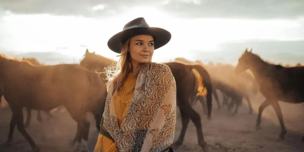 Woman in a cowgirl attire