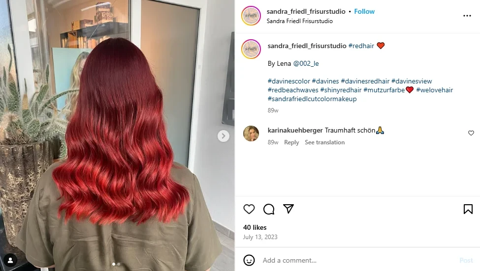 Woman showing the back of her red beach waves
