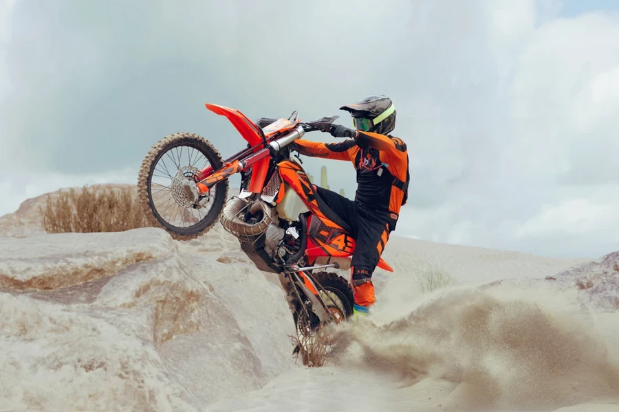 Young man riding on a dirt bike