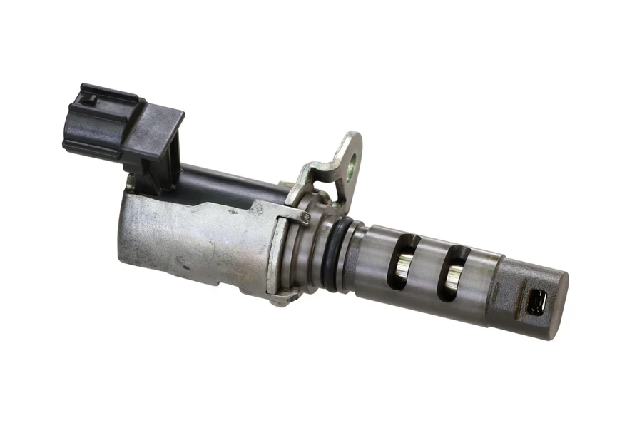 A VVT solenoid valve on a white background