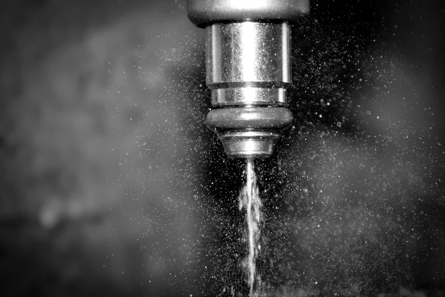 A close-up of a fuel injector in action
