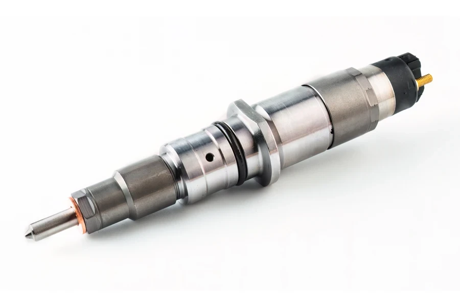 A fuel injector on a white background