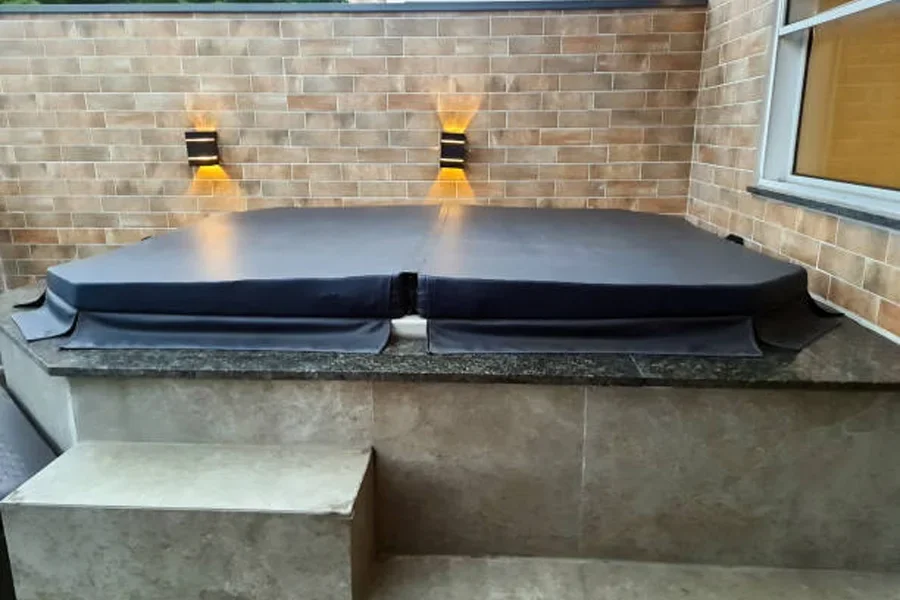 A fully covered hot tub in a backyard