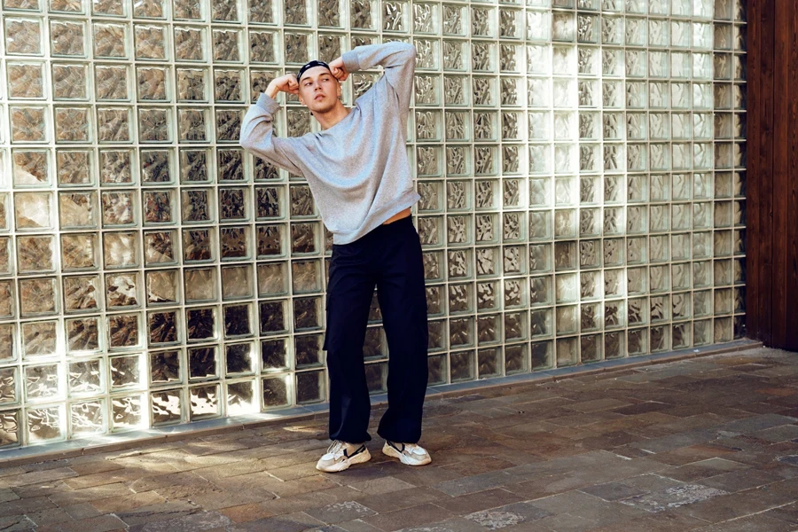 A guy wearing wide-leg sweatpants