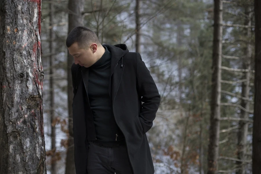 A man wearing a fringe coat