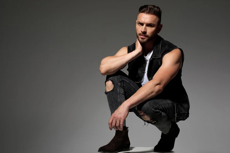 A man wearing a suede vest
