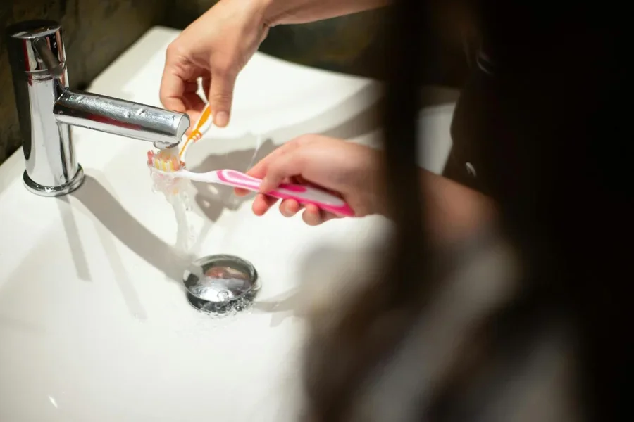 A person brushing their teeth