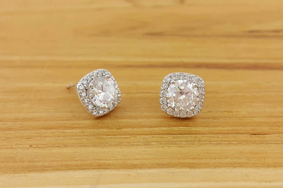 A photo of moissanite cushion-cut halo studs