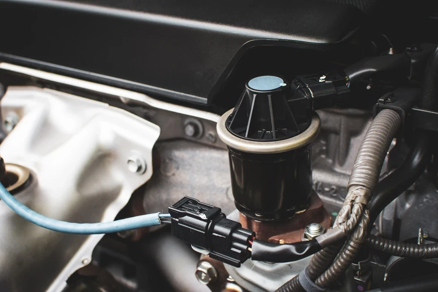 A purge valve in a car's engine compartment