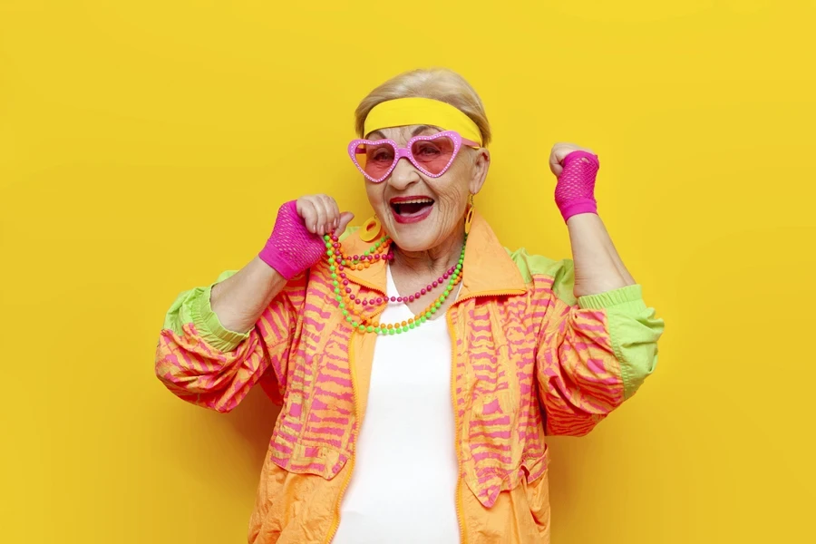 A senior woman wearing retro sunglasses