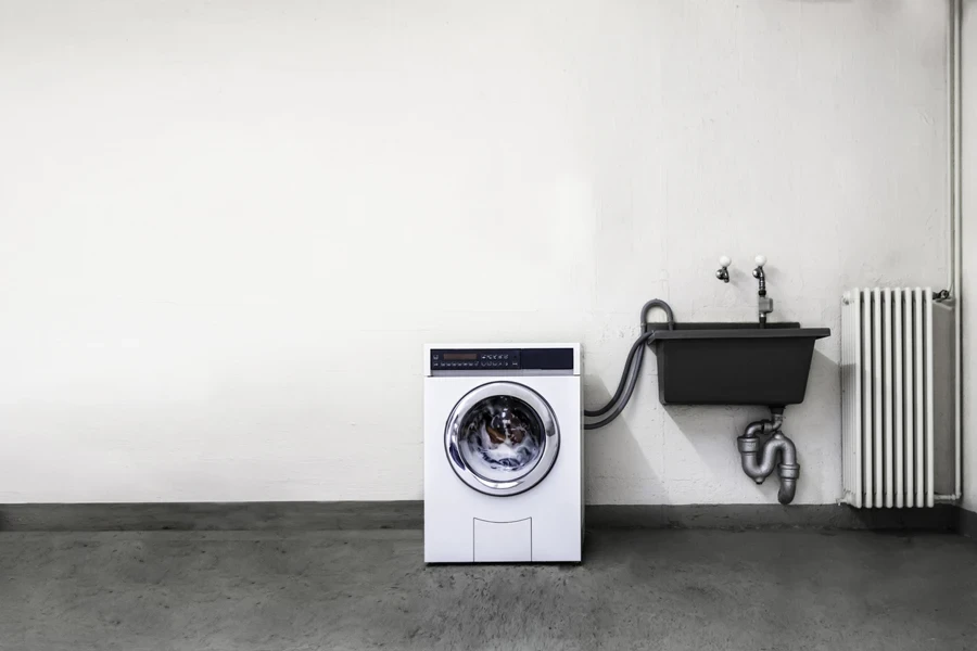 A washing machine in a laundry room