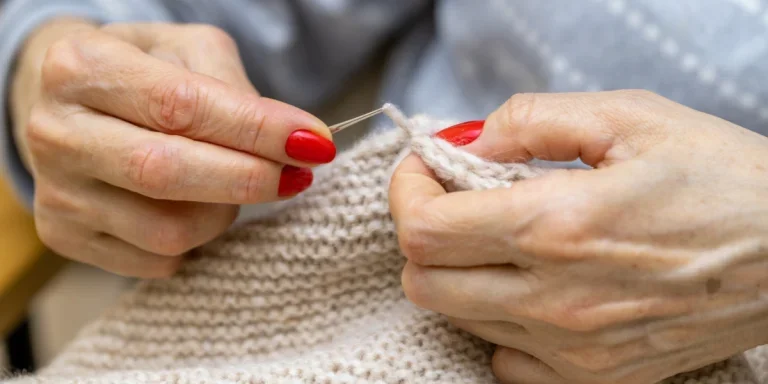 A woman knitting clothes from a bamboo yarn
