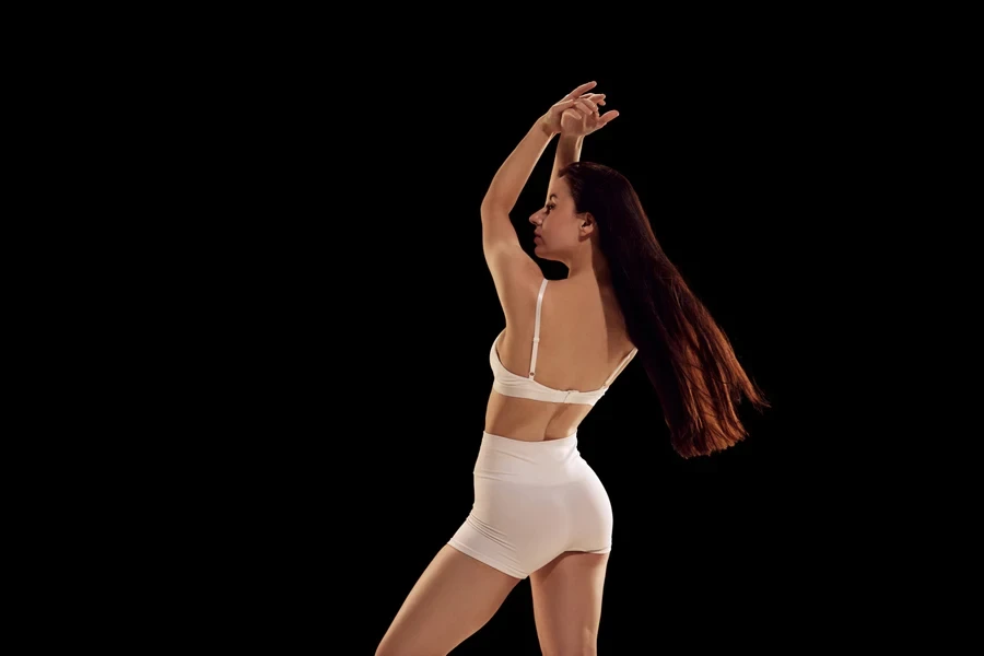 A woman posing with shaping shorts
