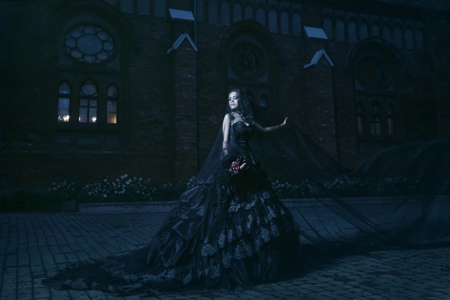 A woman wearing a Victorian romance dress