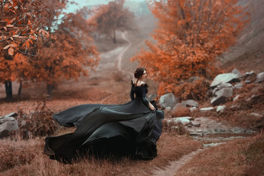A woman wearing a gothic bridal dress
