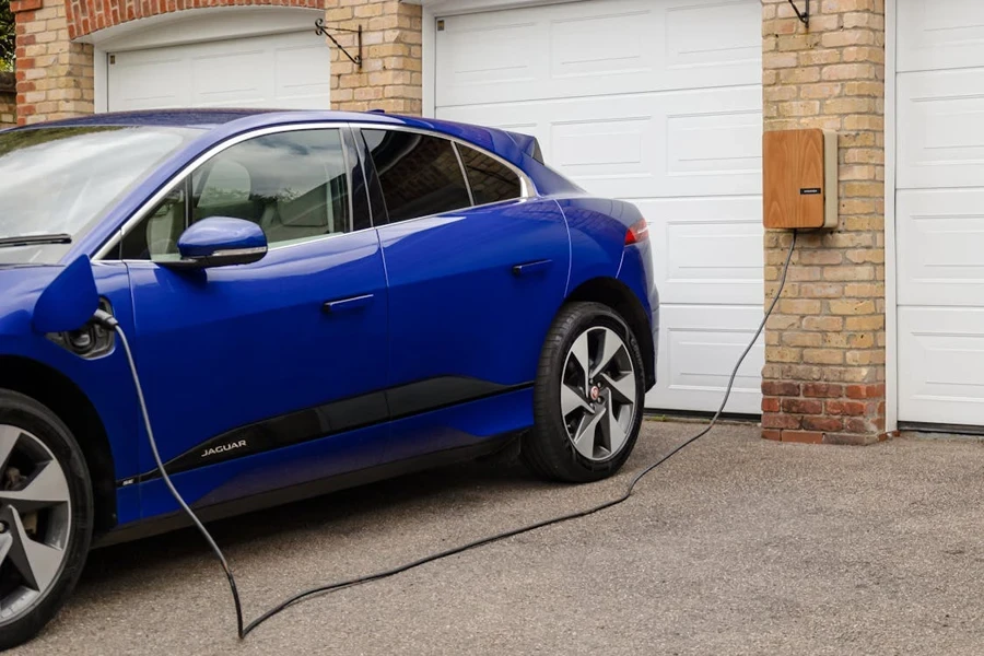 An EV home charger mounted on a wall