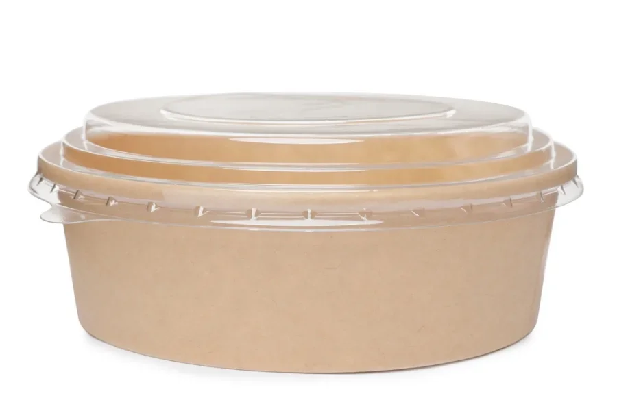 An empty paper soup bowl with a plastic lid