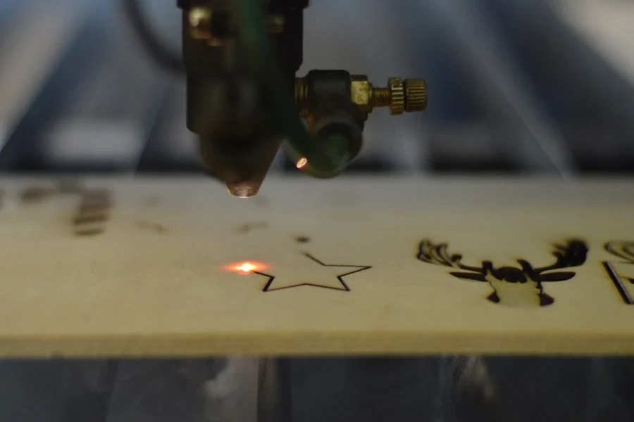 An etching machine engraving a star