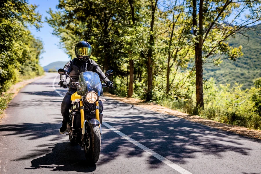 Biker riding with full safety gear