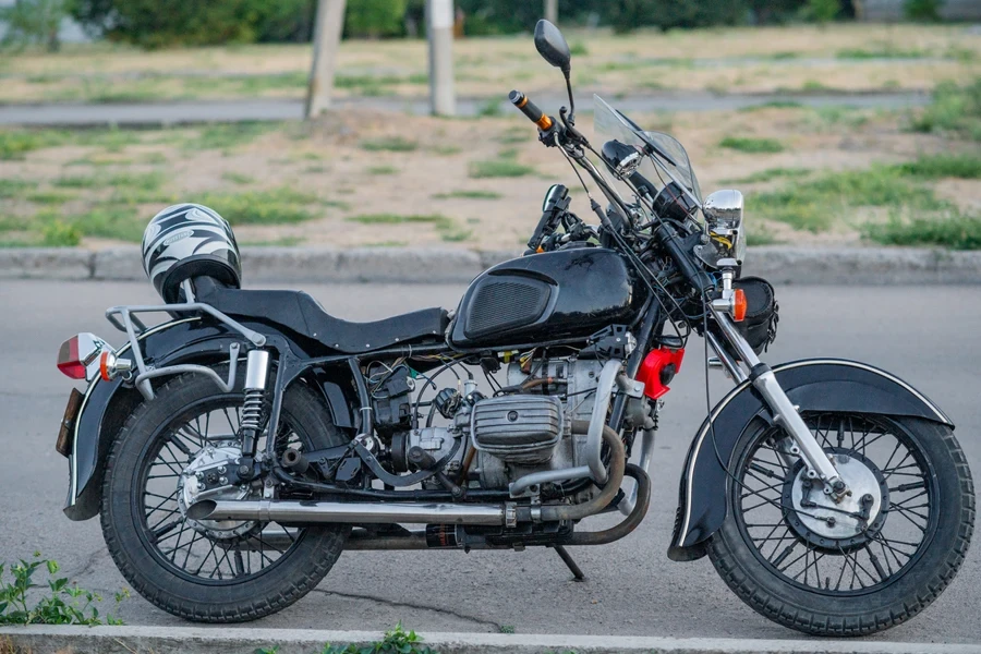 Black motorcycle parked on a road