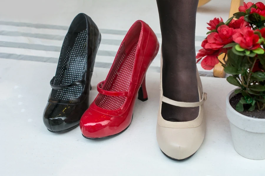 Black, red, and beige wide-toe Mary Jane shoes