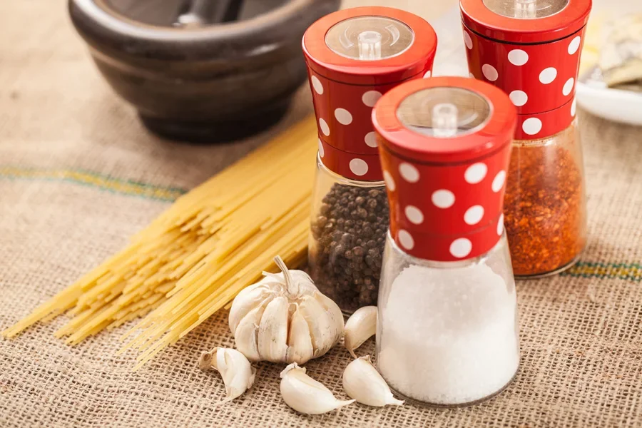 Ceramic grinder with bright red pattern on the body