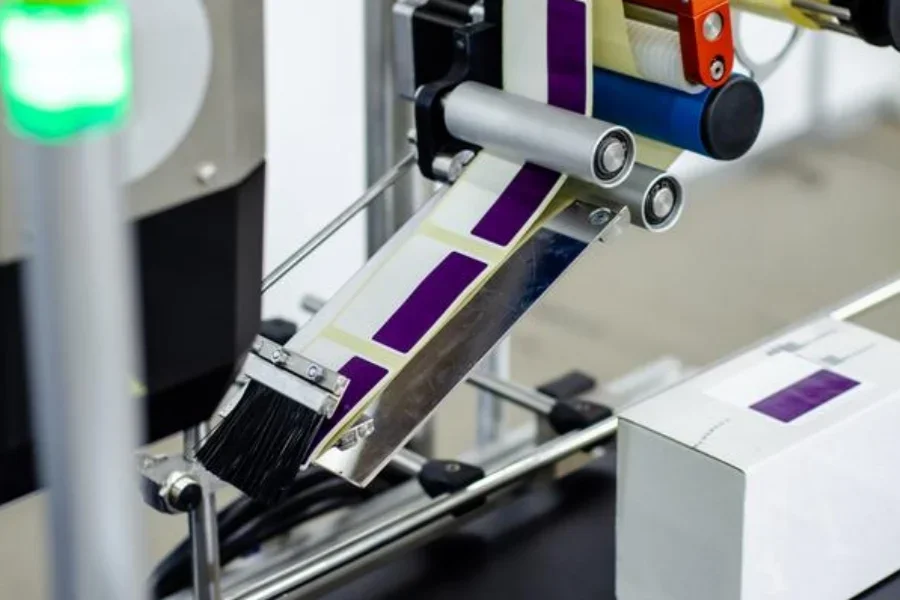 Close-up of automatic sticker labeling machine