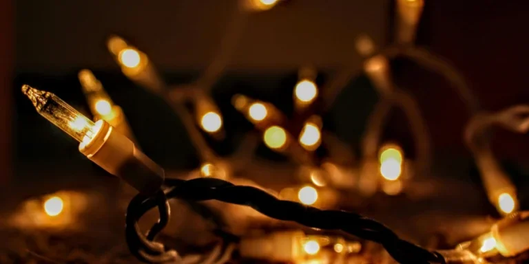 Close-up of warm glowing string lights creating a cozy ambiance with bokeh