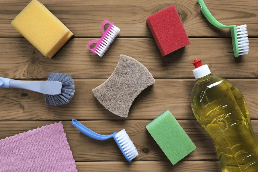 Colorful nylon scrub brushes with soap and dish sponges
