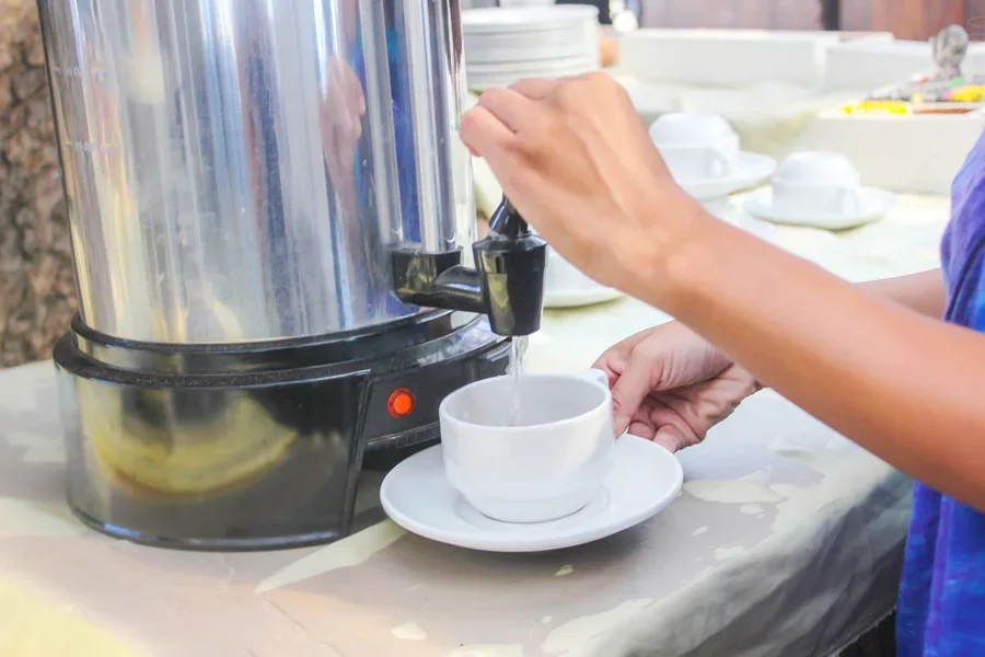 Large coffee percolator made of metal